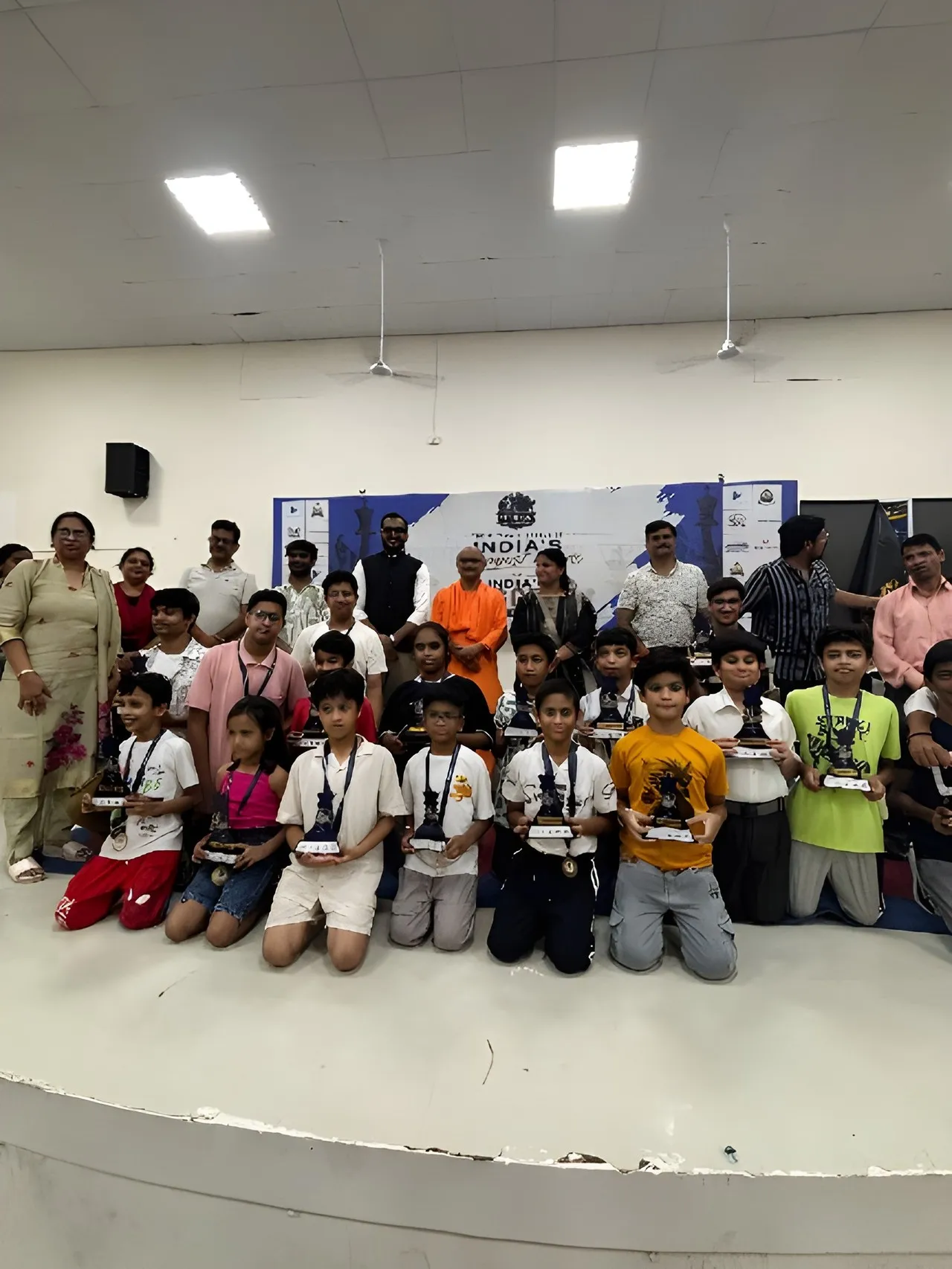 Players with their trophies and medals after the prize distribution at the Prime Engage Jr. Chess Championship