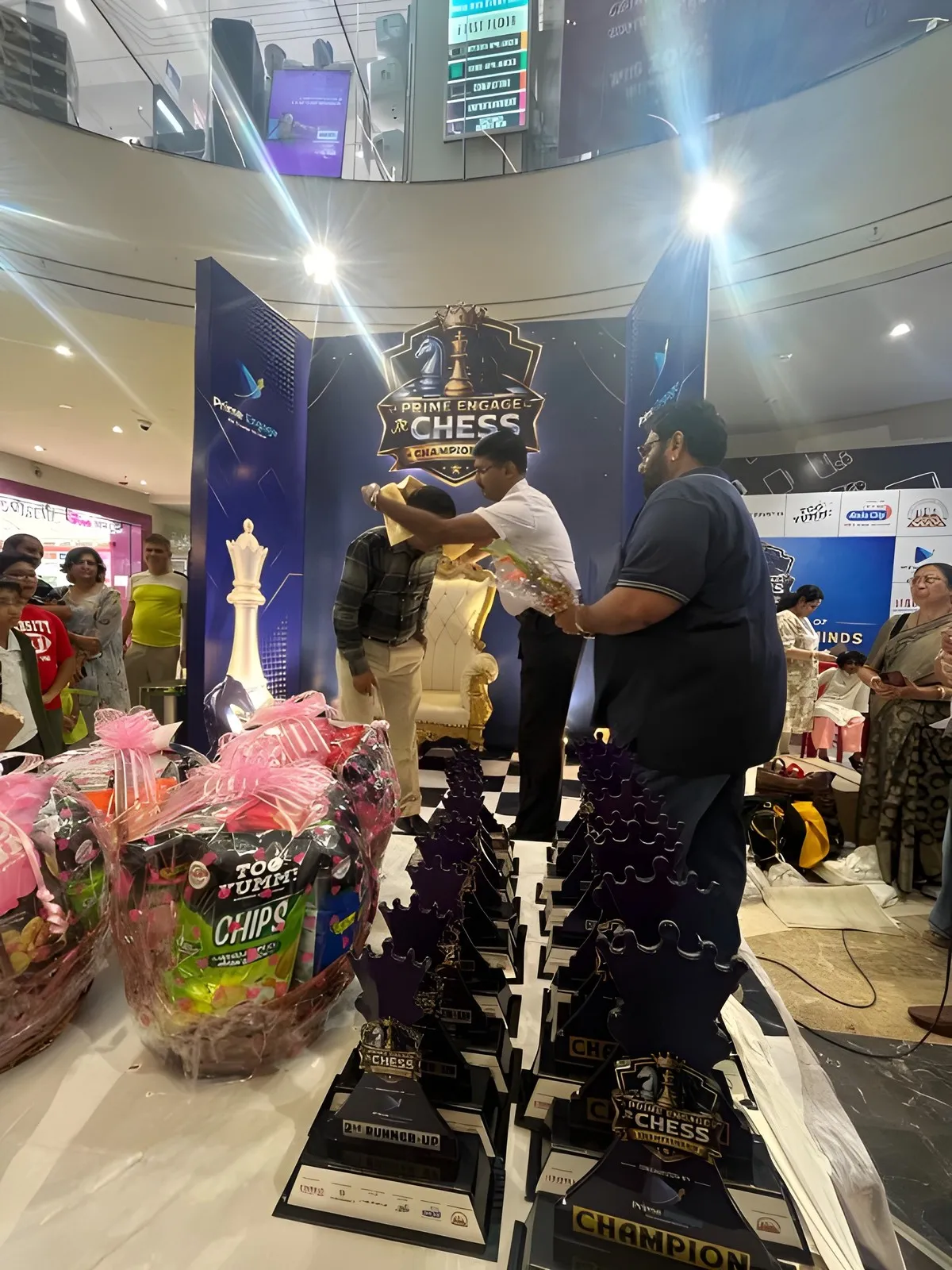 Trophies and hampers laid out at the prize table, Kolkata round of the Prime Engage Jr. Chess Championship