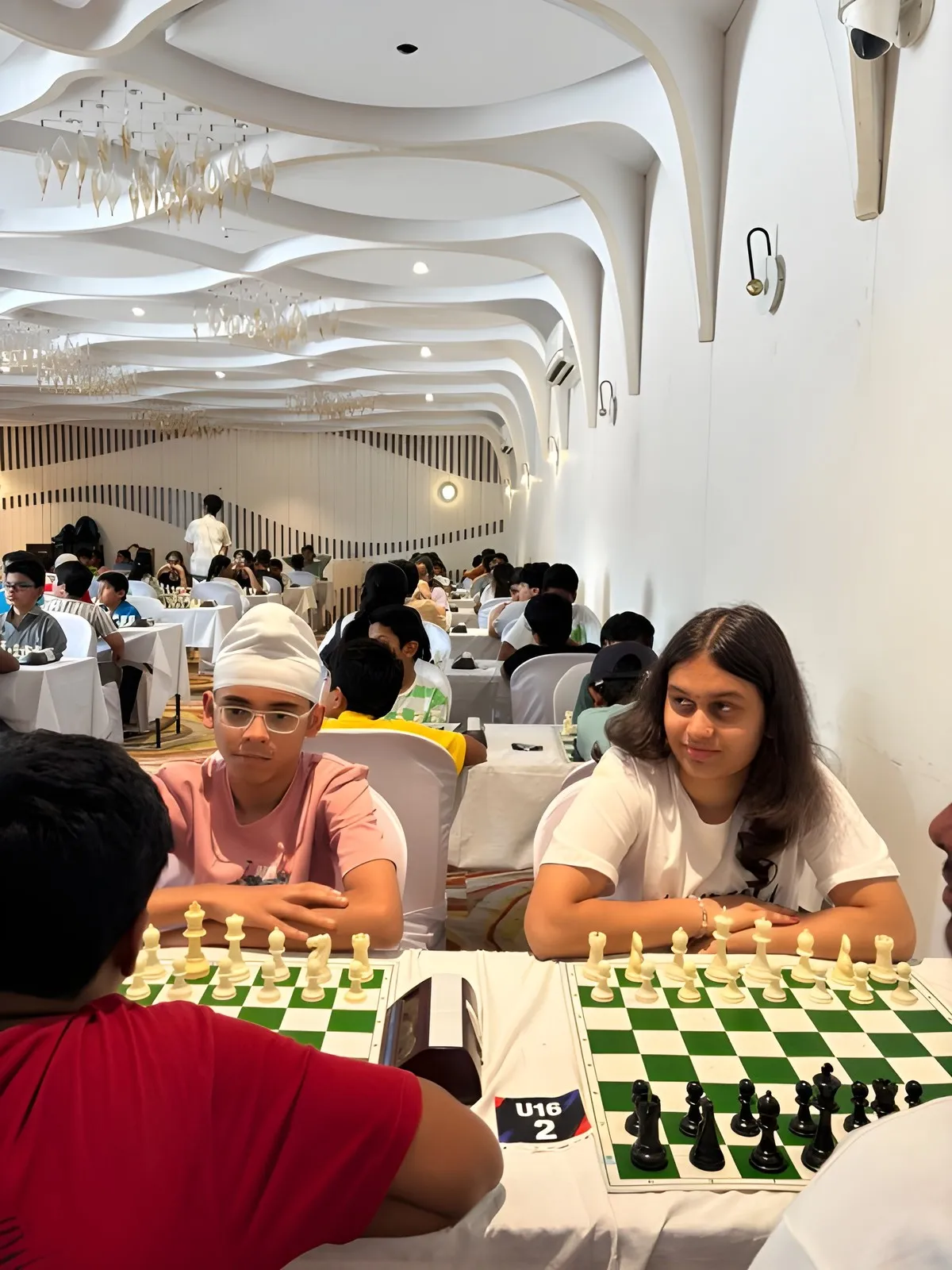 Young players seated at their boards in the hall during the Nagpur round of the Prime Engage Jr. Chess Championship