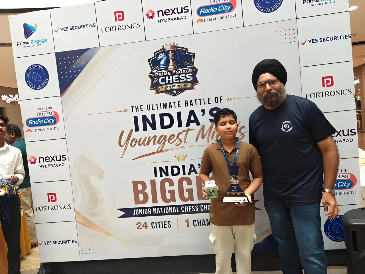 Prize distribution at the championship backdrop.