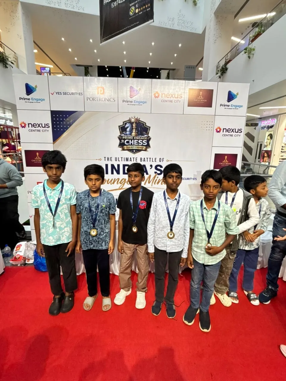 Category winners and runners-up with their trophies.