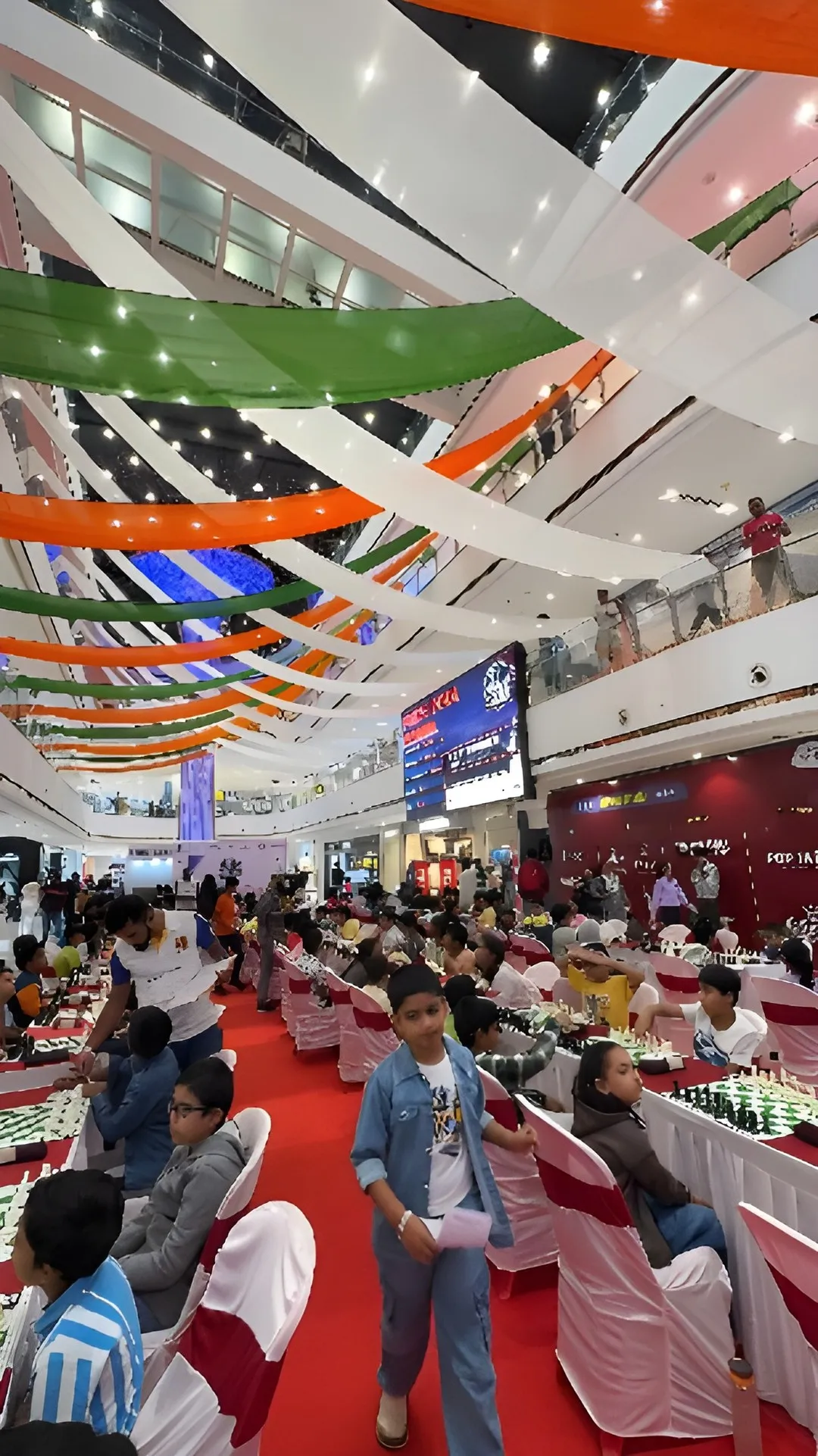 Boards under the tricolour streamers at Nexus Westend.